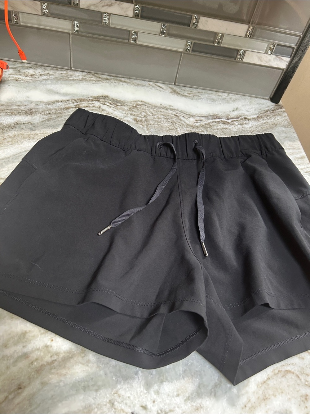 Lululemon athleticaShorts Womens Sz  10 Black On The Fly" Woven Casual